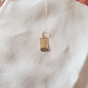 14K gold pendant.